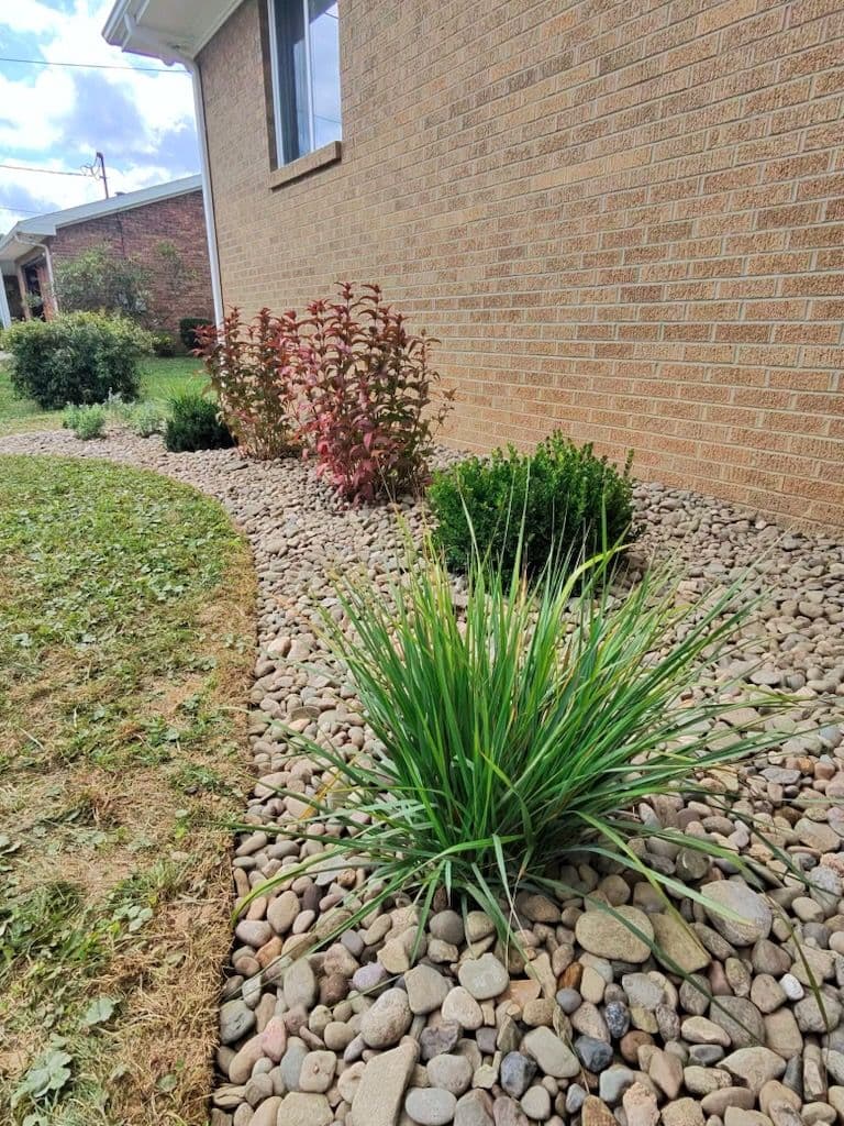 Enhanced Curb Appeal with River Rock Landscaping image