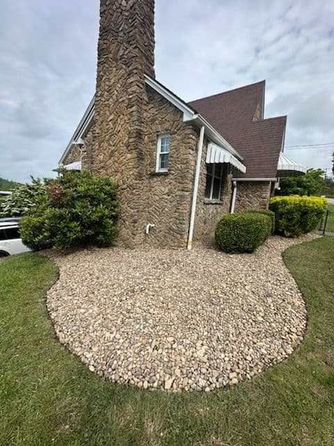 Fairmont Home Elegance with River Rock Landscaping