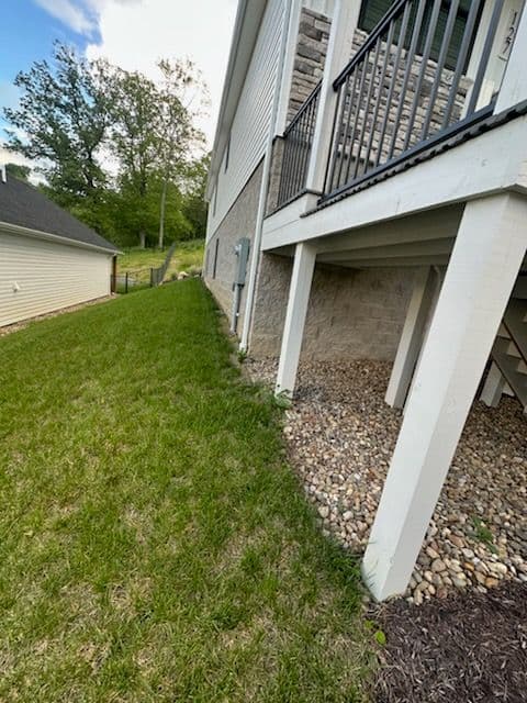 Transform Your Backyard with Sod and River Rock
